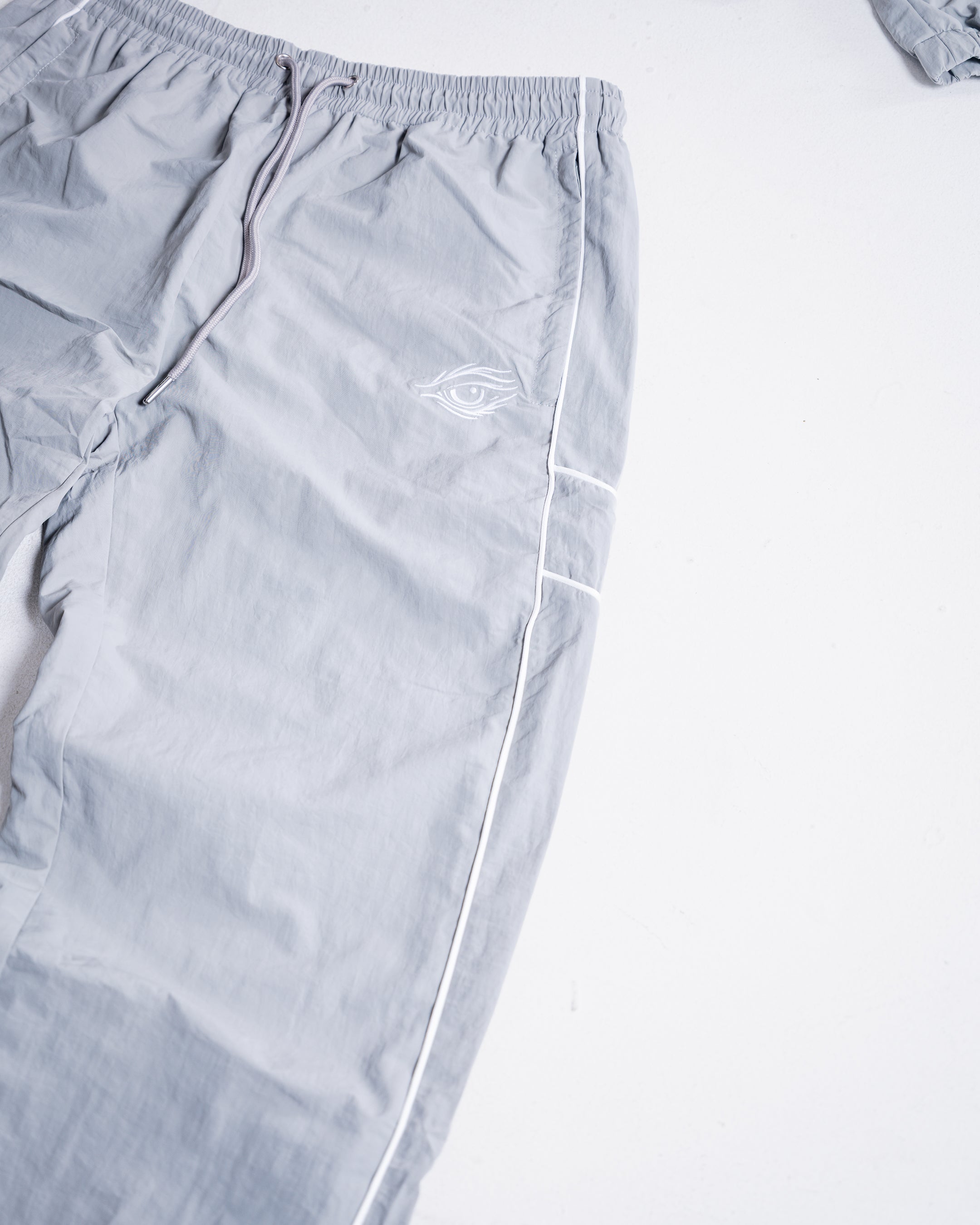 "DAWN" NOCTURNE WINDBREAKER PANTS